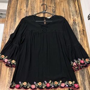 Bell sleeve black floral top